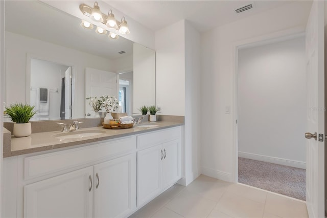 410 Cheeota Ct, Minneola, FL 34715 - bathroom with double vanity and tile patterned flooring
