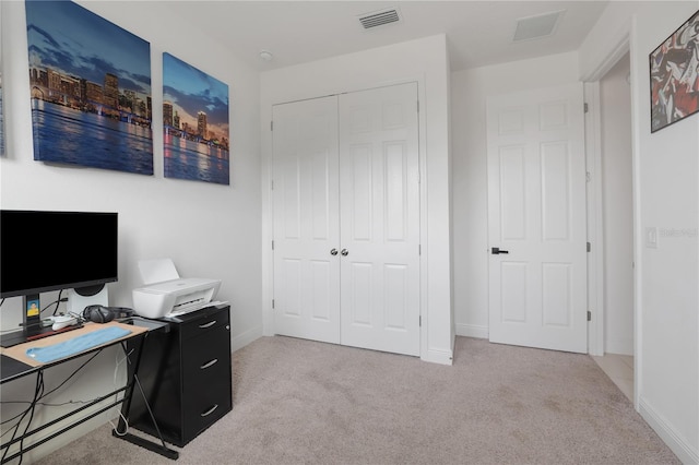 home office featuring light colored carpet