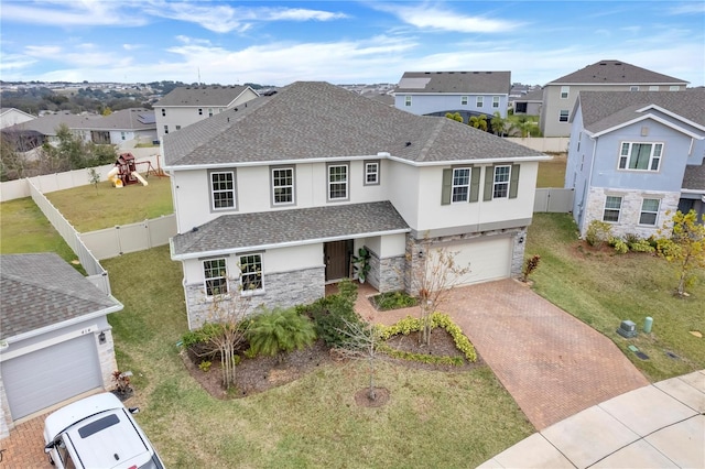 410 Cheeota Ct, Minneola, FL 34715 - traditional-style home featuring stucco siding, a residential view, decorative driveway, and roof with shingles
