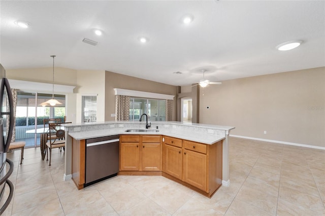 kitchen featuring a kitchen island with sink, sink, stainless steel dishwasher, ceiling fan, and decorative light fixtures