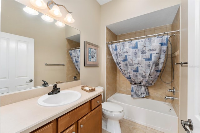 full bathroom featuring tile patterned flooring, vanity, toilet, and shower / tub combo