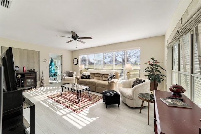 living room with ceiling fan