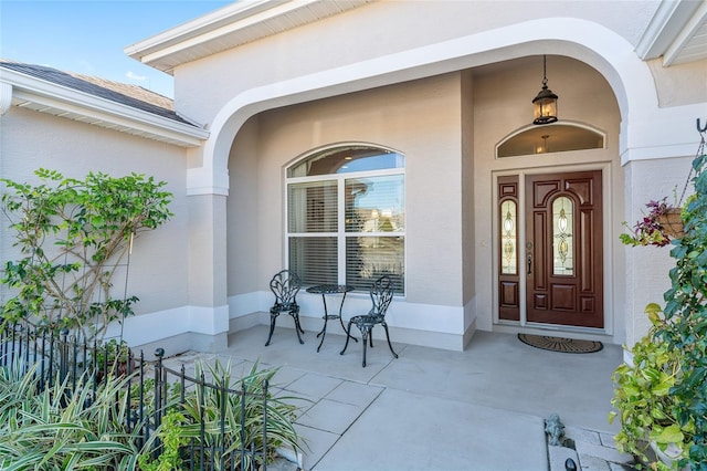 property entrance with a porch