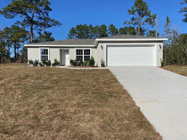 ranch-style house with a garage and a front yard