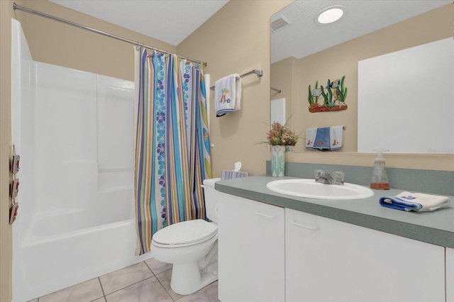 full bathroom featuring toilet, shower / bath combination with curtain, vanity, and tile patterned floors