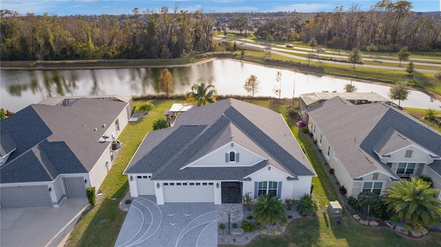 bird's eye view with a water view