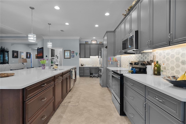 kitchen with stainless steel appliances, decorative backsplash, decorative light fixtures, ornamental molding, and sink