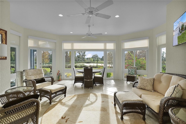 sunroom / solarium with ceiling fan