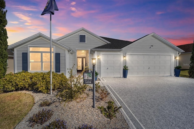 view of front of property with a garage