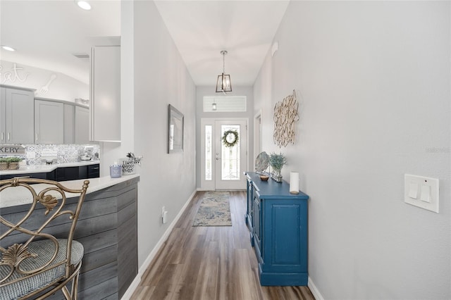 foyer with hardwood / wood-style floors