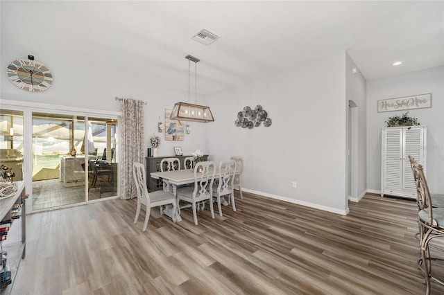 dining room featuring hardwood / wood-style flooring