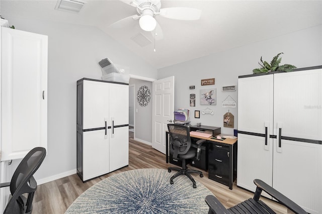 office with lofted ceiling, ceiling fan, and hardwood / wood-style floors