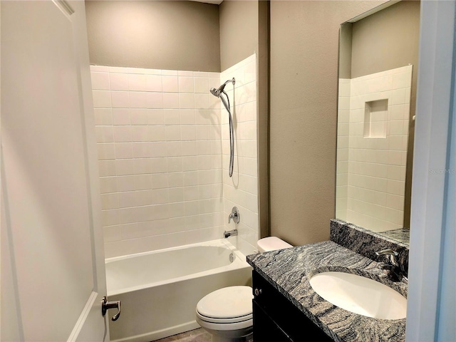 full bathroom with vanity, shower / bath combination, and toilet