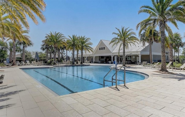 8065 Penrose Pl, Wildwood, FL 34785 - community pool with a patio