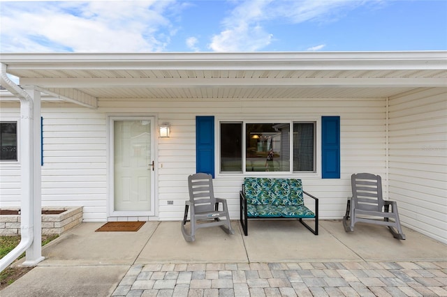 entrance to property with a porch