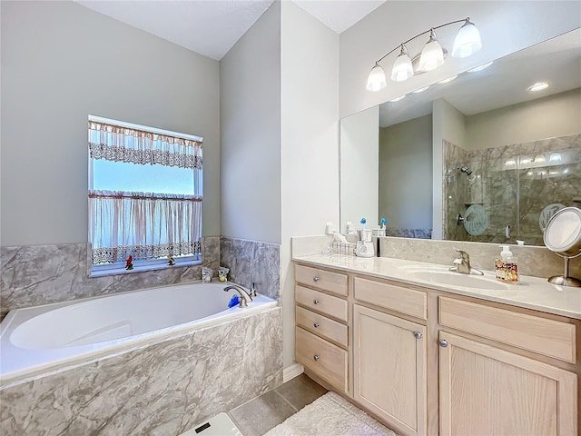 bathroom featuring vanity, tile patterned flooring, and plus walk in shower