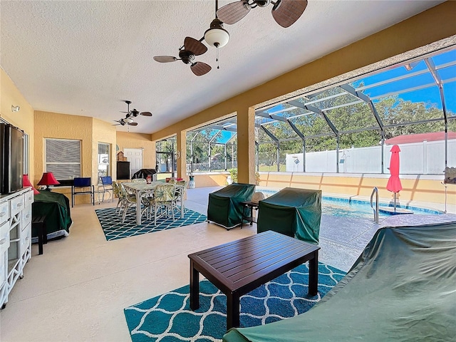 view of patio with a fenced in pool, glass enclosure, ceiling fan, and a grill