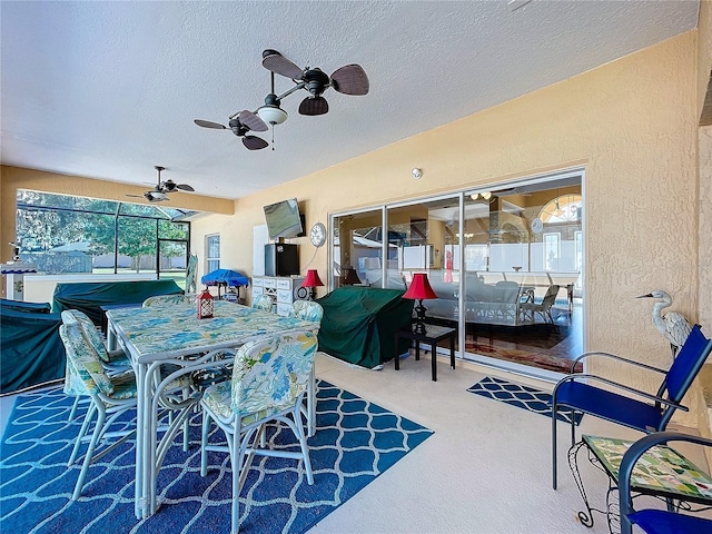 view of patio with ceiling fan