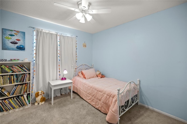 bedroom with light carpet and ceiling fan