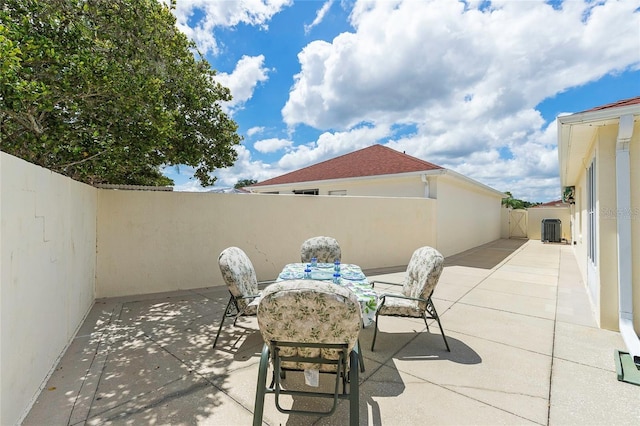 view of patio / terrace with central AC unit