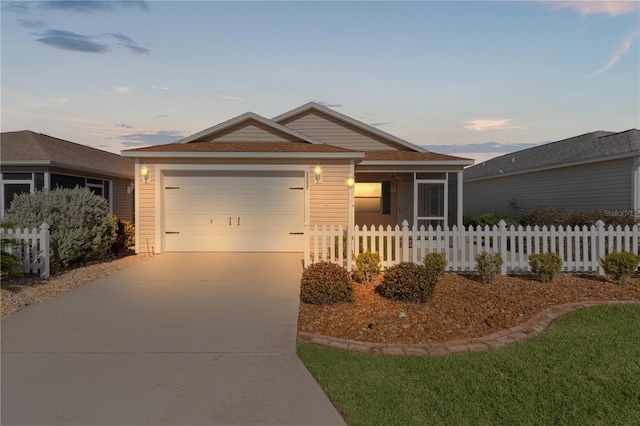 single story home featuring a garage