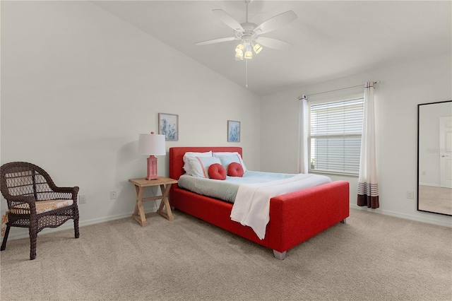 bedroom with light colored carpet, vaulted ceiling, and ceiling fan