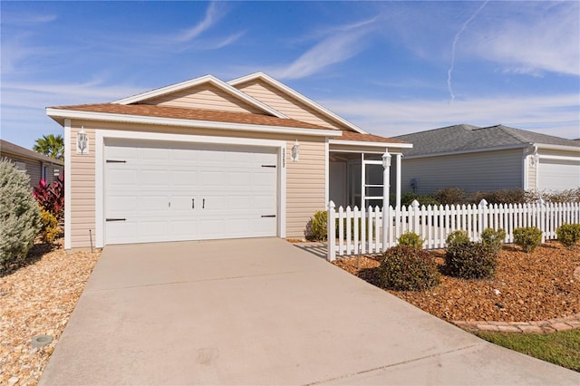 single story home featuring a garage