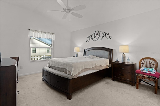 bedroom featuring ceiling fan, light colored carpet, and lofted ceiling