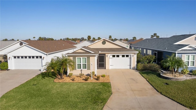 single story home featuring a garage and a front lawn