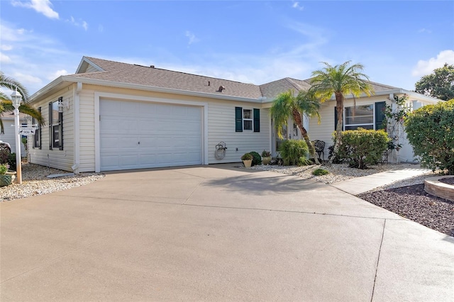 single story home featuring a garage