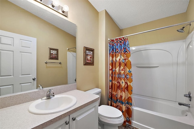 full bathroom featuring toilet, vanity, a textured ceiling, and shower / bath combo with shower curtain