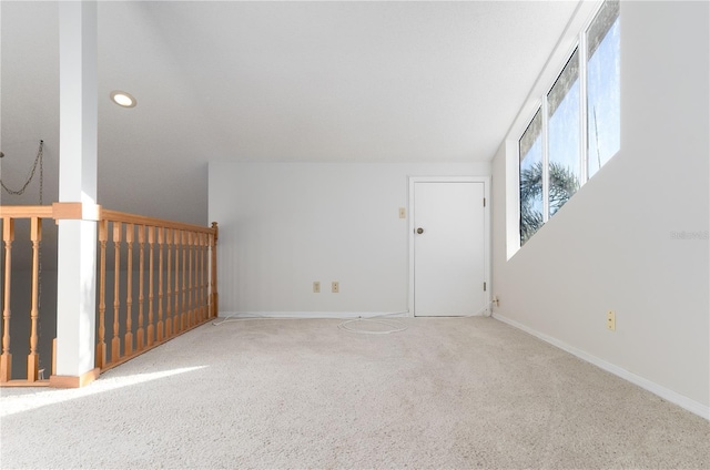 unfurnished living room featuring carpet