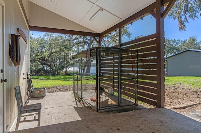 exterior space with vaulted ceiling