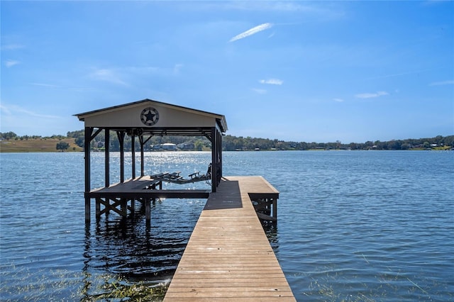 dock area featuring a water view