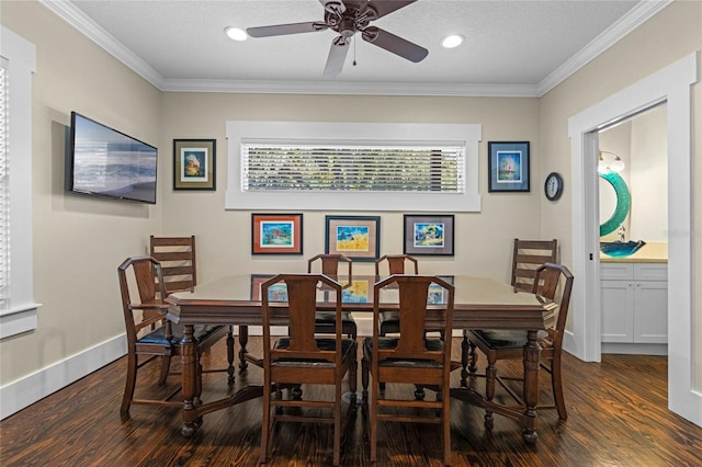 dining room featuring recessed lighting, baseboards, crown molding, and wood finished floors