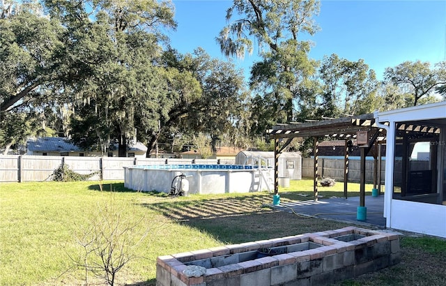 view of yard with a fenced in pool, a shed, and a pergola