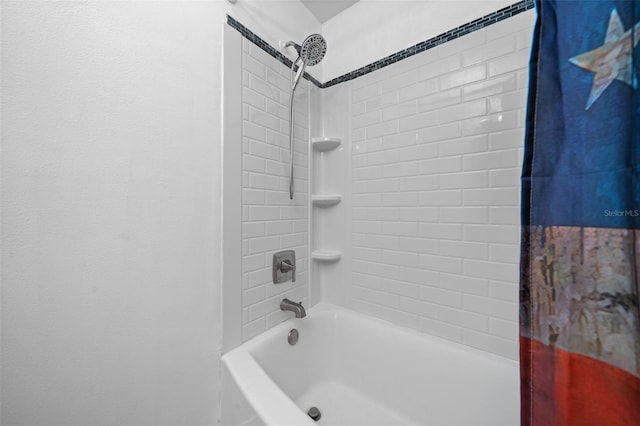 bathroom with shower / bath combination with curtain