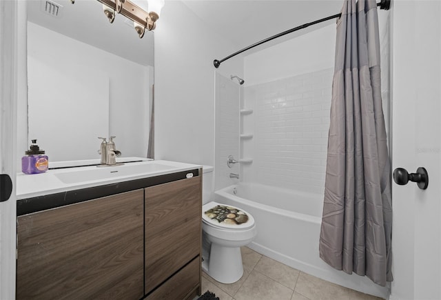 full bathroom with shower / tub combo with curtain, vanity, toilet, and tile patterned flooring