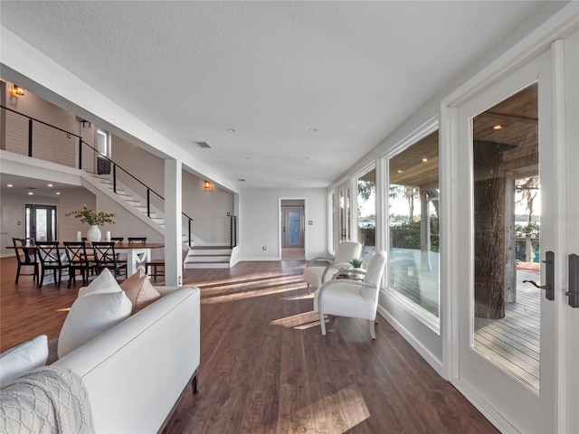 living room featuring dark hardwood / wood-style floors