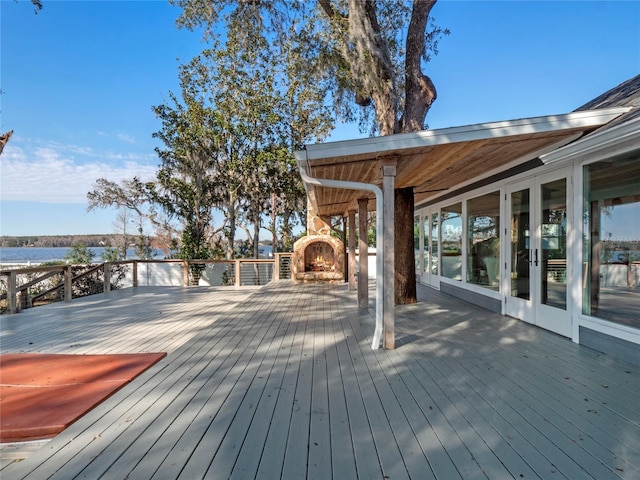 wooden deck featuring french doors