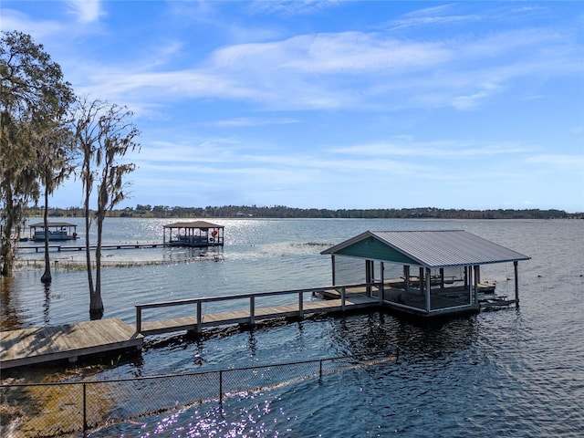 view of dock with a water view