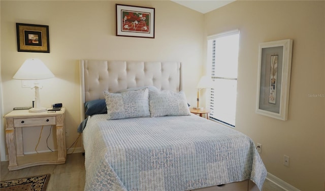 bedroom featuring hardwood / wood-style flooring