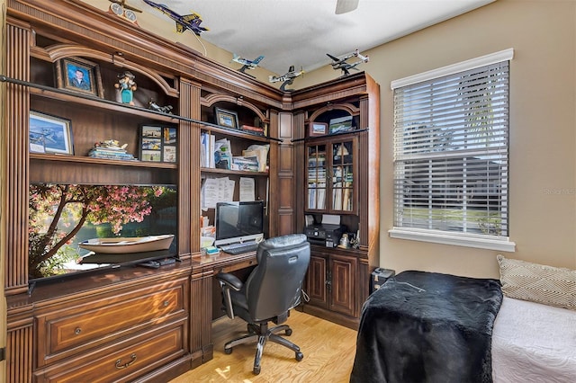 office area with light hardwood / wood-style flooring