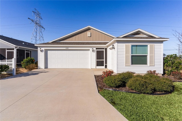 single story home featuring a garage