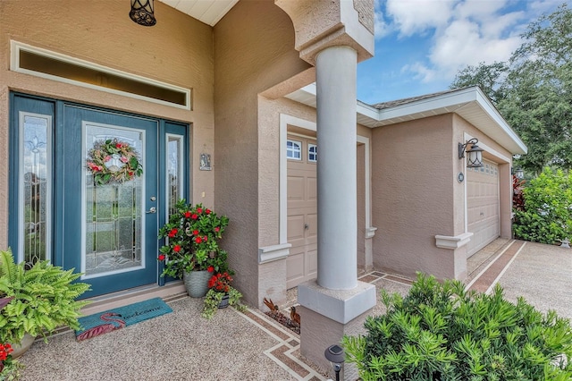 entrance to property with a garage