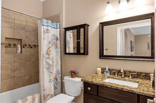 full bathroom featuring shower / tub combo, vanity, toilet, and ornamental molding