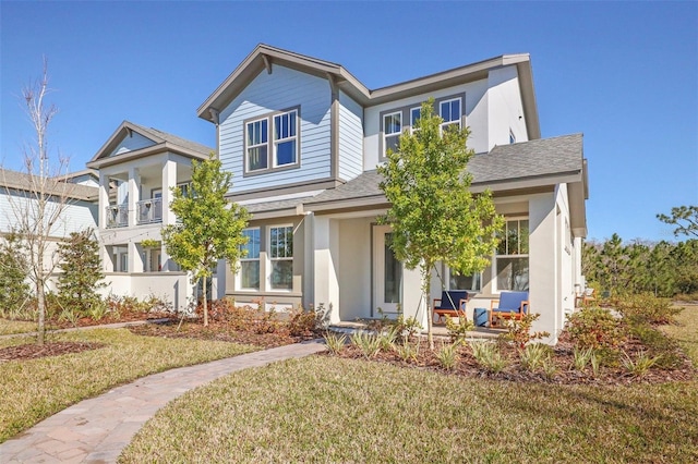 view of front of property featuring a front lawn