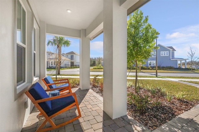 view of patio featuring a porch