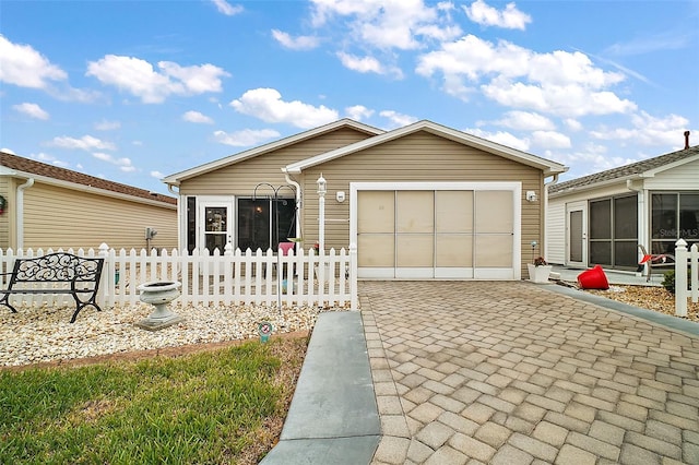 view of front of property with a garage