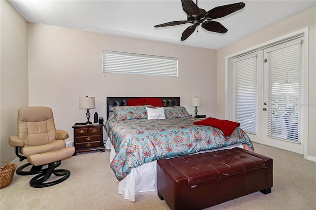 carpeted bedroom featuring access to exterior and ceiling fan